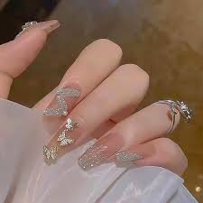 Amazon.com: RikView Long Press on Nails Glitter Acrylic Nails with Butterfly Design Coffin Fake Nails Nude Nails : Beauty & Personal Care